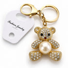 Da Meso Teddybär-Schlüsselanhänger mit Strass und Perle in Gold und Silber – elegantes Accessoire für Handtasche und Schlüsse