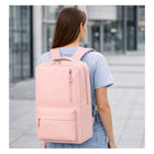 Grauer Sportrucksack mit Laptopfach, USB-Anschluss, gepolsterten Schultergurten und großem Stauraum für Schule, Universität, Arbeit, Reisen und Handgepäck im Flugzeug